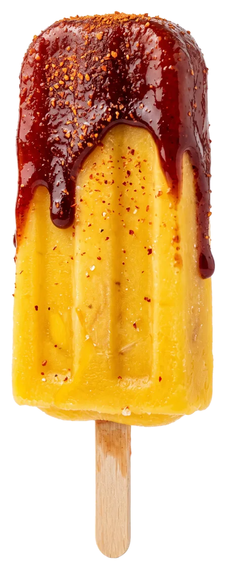 A mango paleta dipped in chamoy and chile-lime powder